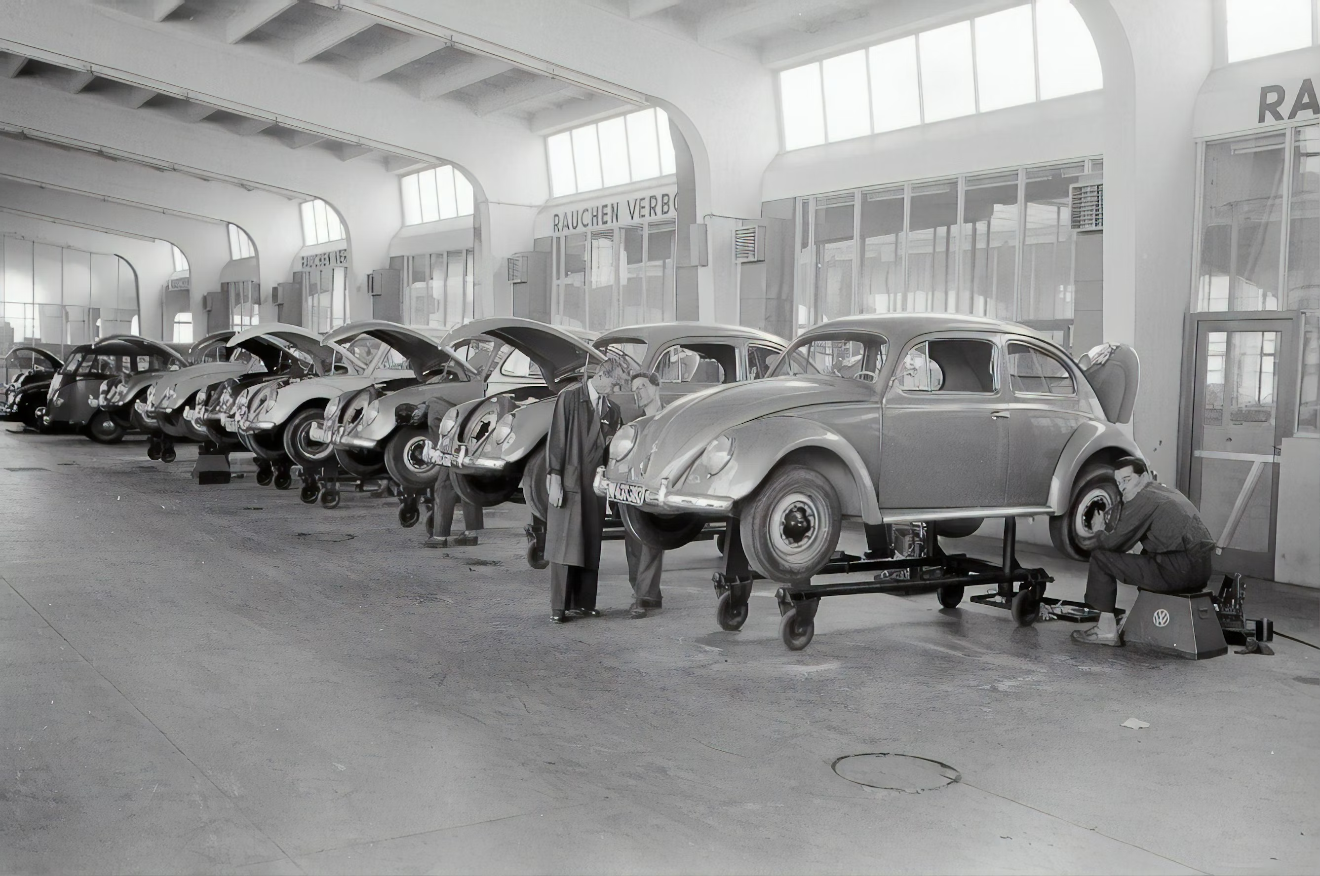 A VW Beetle assembly line - Credits to the Austrian National Library